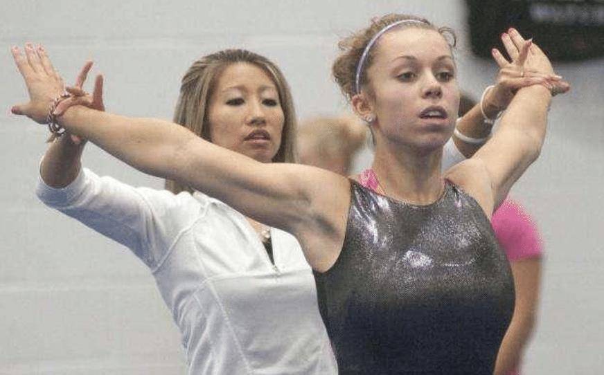 奥运冠军陆莉:16岁摘体操桂冠,18岁退役后嫁老外,生下一混血儿_训练