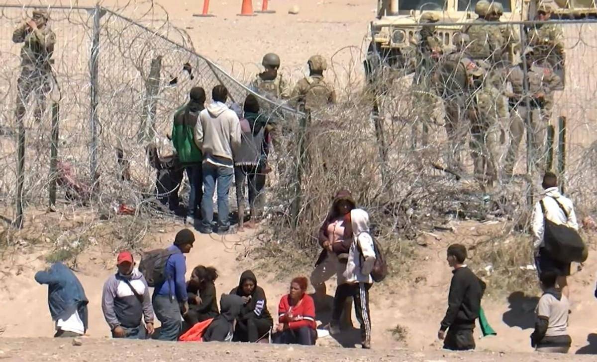 原创非法移民冲破铁丝网跟拜登双向奔赴得州进入战争状态