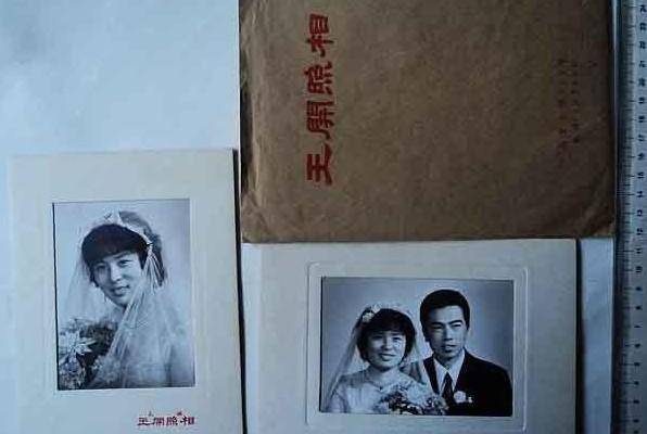 照相馆结婚照三2005年,"王开照相馆"正式更名为上海王开摄影有限公司