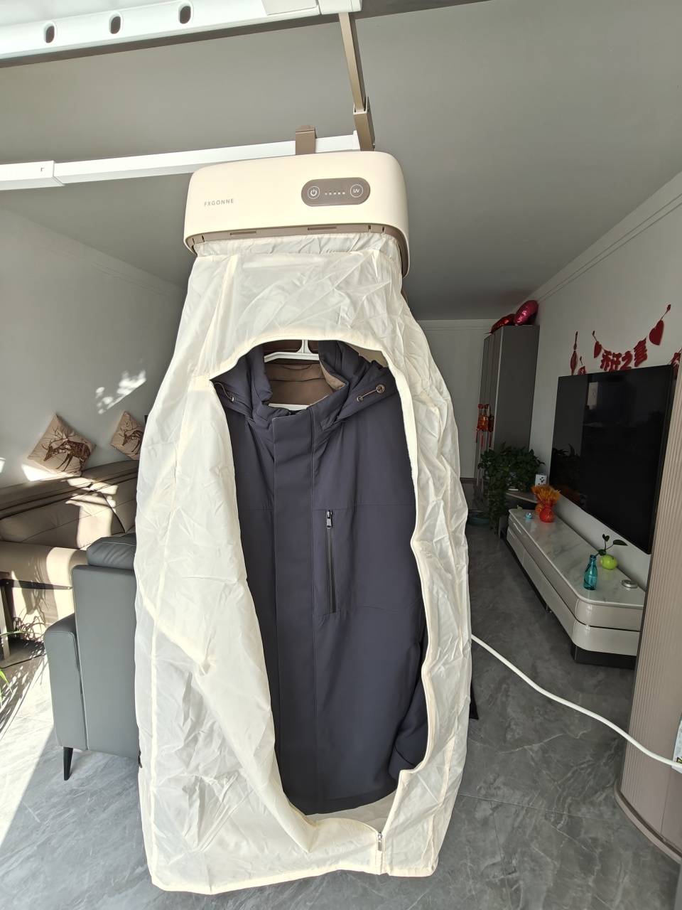 宫菱便携烘干机深度评测:首创烘蒸双模式,专攻厚衣速干无盲区,安全护衣更出色!