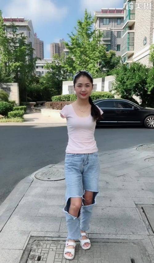 她9岁因电击失去双臂,靠双脚刺绣维持生活,如今成老板身家千万_杨佩