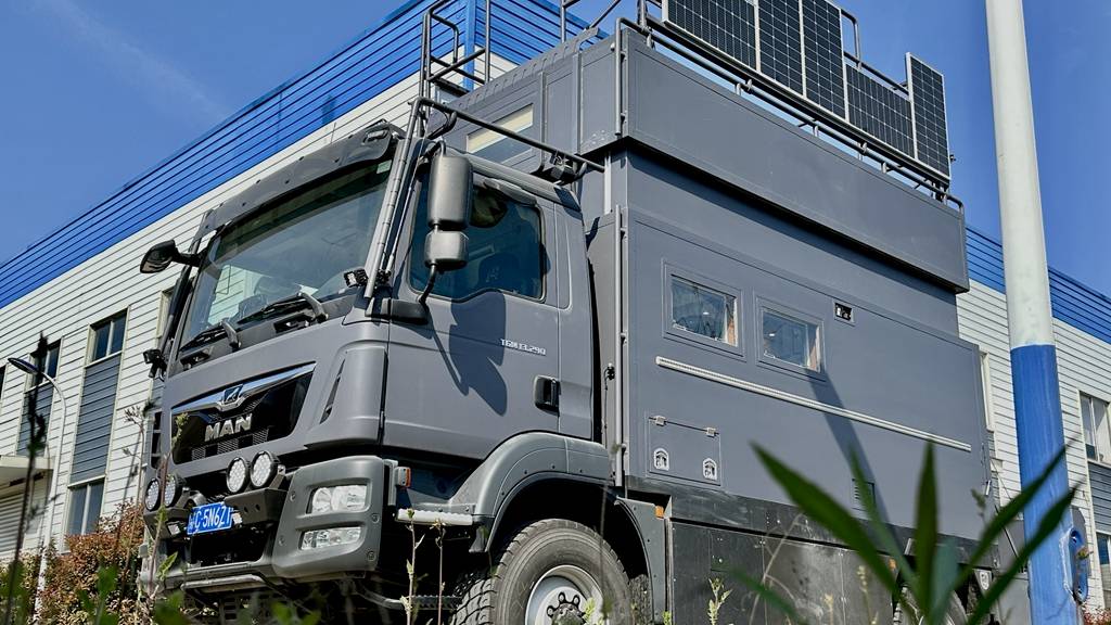 飞桥 后翻转阳台德国man卡车四驱房车_搜狐汽车_搜狐网