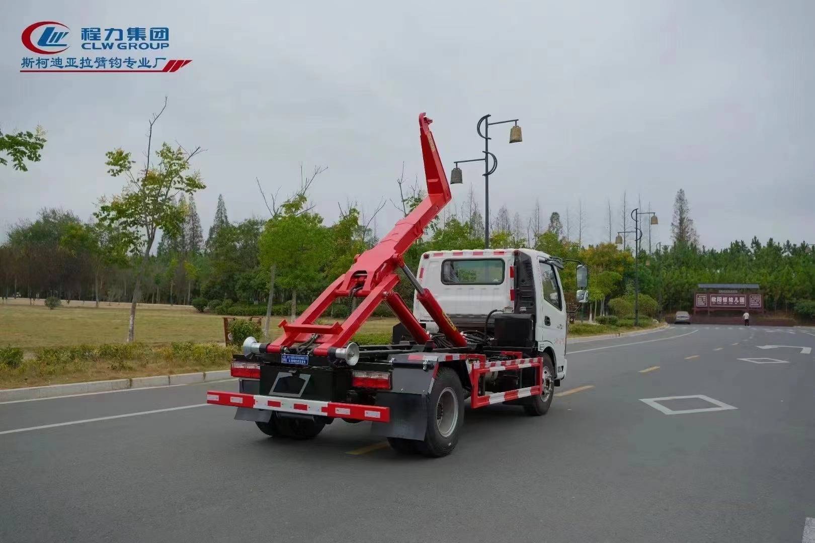 飞碟奥驰x2国六黄牌车厢可卸式垃圾车