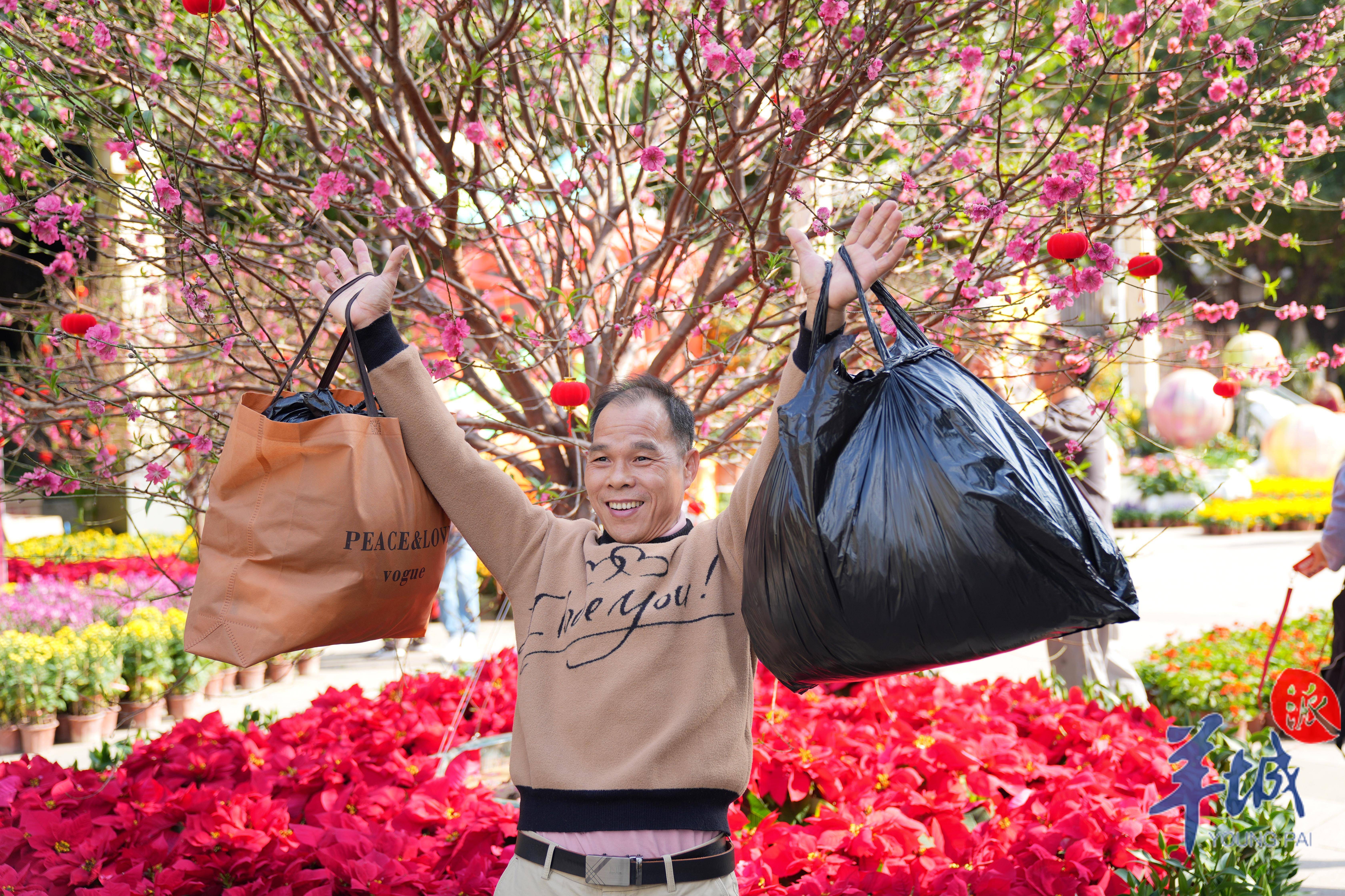 广州文化公园"迎春花会"提前探_花景_主题_市民