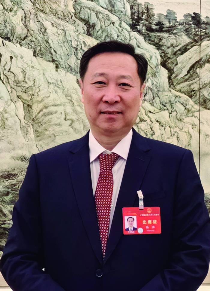 全国人大代表麒麟信安董事长杨涛建立市场引导机制推进国产操作系统和