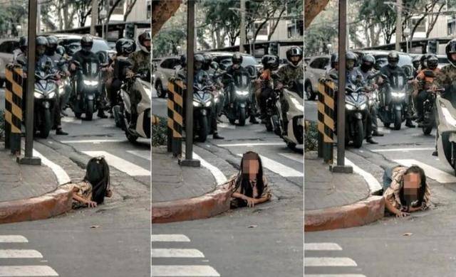 女子街头寻求路人帮忙拍照渗人！女子从菲律宾闹市排水道爬出画面惊悚像恐怖电影